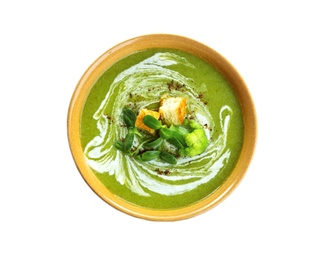 Bowl of broccoli cream soup with croutons on white background, top view