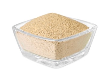 Photo of Glass bowl of active dry yeast isolated on white