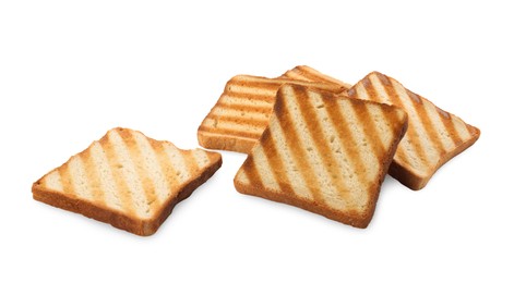 Slices of delicious toasted bread on white background
