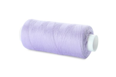 Spool of violet sewing thread isolated on white