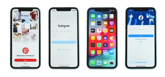 Image of MYKOLAIV, UKRAINE - JULY 07, 2020: New modern iPhone 11 with Facebook, Instagram, Pinterest apps and home screen against white background