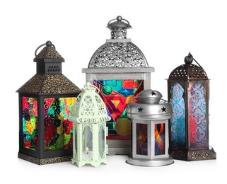 Different decorative Arabic lanterns on white background