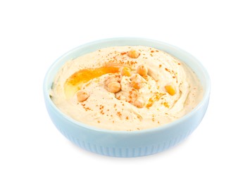 Tasty hummus with garnish in bowl isolated on white