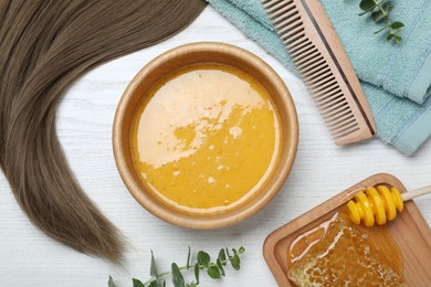 Flat lay composition with homemade hair mask in bowl on white wooden table