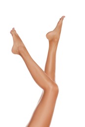 Woman with beautiful long legs on white background, closeup