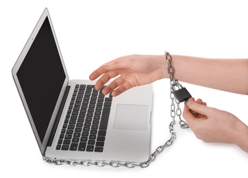 Woman showing hand chained to laptop on white background, closeup. Internet addiction