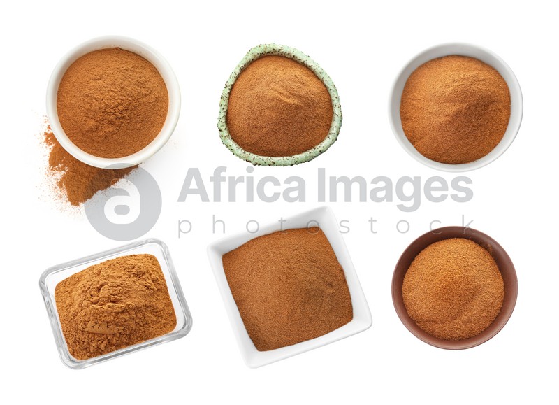 Set with aromatic cinnamon powder on white background, top view