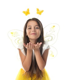 Cute little girl in fairy costume with yellow wings on white background
