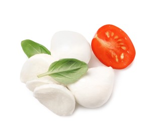Photo of Delicious mozzarella, tomato and basil leaves on white background, top view