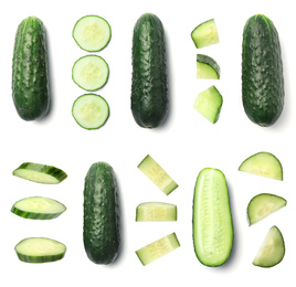 Set with sliced cucumbers on white background, top view
