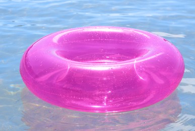 Bright inflatable ring floating on sea water