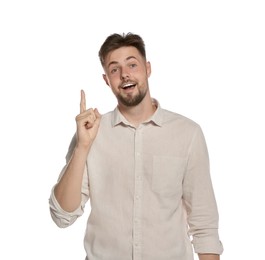 Handsome young man gesturing on white background