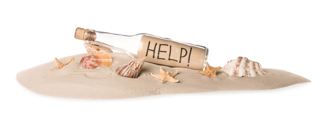 Corked glass bottle with Help note and seashells on sand against white background