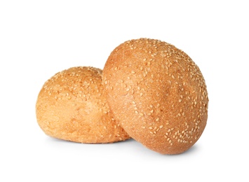 Fresh burger bun with sesame seeds isolated on white
