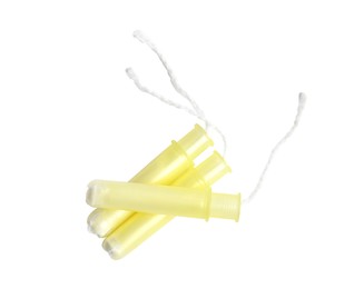 Applicator tampons on white background, top view. Menstrual hygiene product
