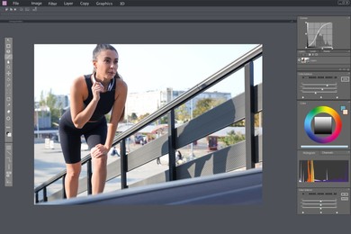 Professional photo editor application. Image of young woman in sportswear with headphones