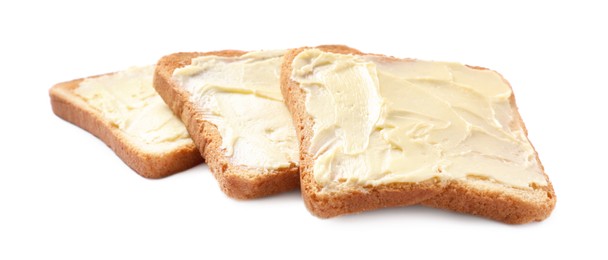 Tasty toasts with butter on white background