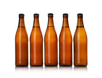 Brown bottles with beer isolated on white