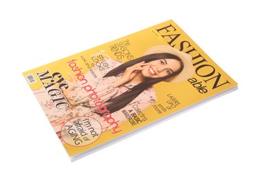 Modern printed fashion magazine isolated on white