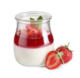 Delicious panna cotta with strawberry coulis and fresh berries on white background