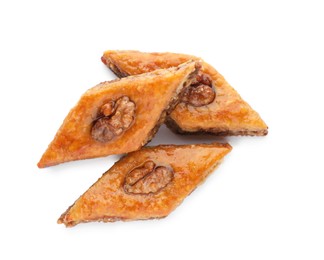 Delicious turkish baklava on white background, top view. Eastern sweets