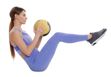 Athletic woman doing exercise with medicine ball isolated on white
