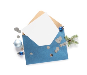 Blank greeting card in envelope and Christmas decor on white background, top view. Space for text