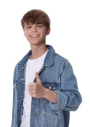 Photo of Teenage boy showing thumb up on white background