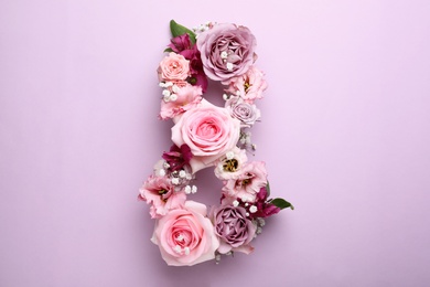 Number 8 made of beautiful flowers on violet background, flat lay. International Women's day