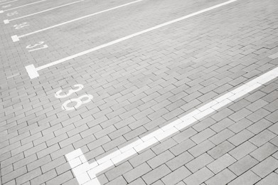Outdoor car parking lots with white marking lines
