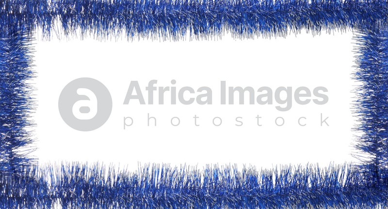 Frame made of shiny blue tinsels on white background, top view. Space for text