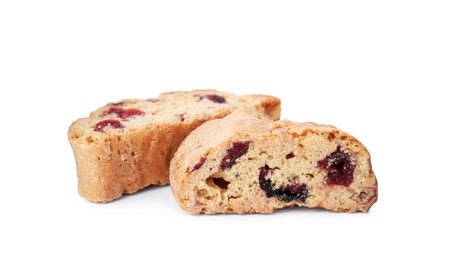 Slices of tasty cantucci with berry on white background. Traditional Italian almond biscuits