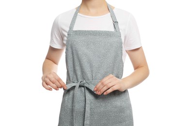 Woman in clean apron with pattern on white background, closeup