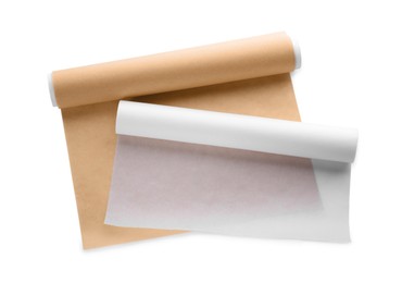 Photo of Rolls of baking paper on white background, top view