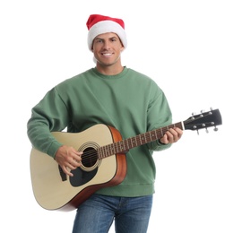 Man in Santa hat playing acoustic guitar on white background. Christmas music