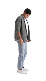 Photo of Unhappy man in casual outfit on white background