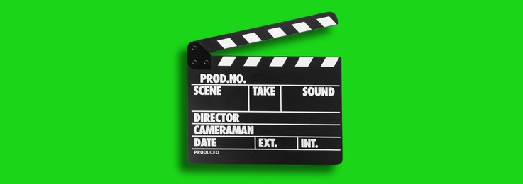Image of Clapper board on chroma key background, top view. Banner design