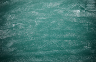 Dirty green chalkboard as background. Space for text