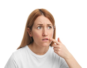Upset woman suffering from herpes on white background