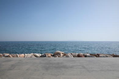 Photo of Beautiful view of embankment and calm sea on sunny day