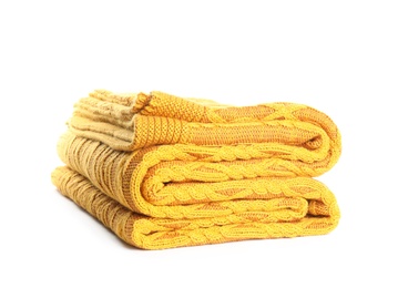 Stylish yellow knitted plaid on white background