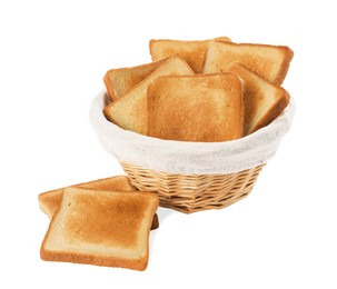 Photo of Wicker basket with slices of delicious toasted bread on white background