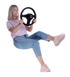 Happy woman with steering wheel on white background