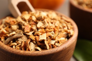 Photo of Bowl of dried orange zest seasoning, closeup