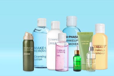 Collection of different makeup removal products on light blue background