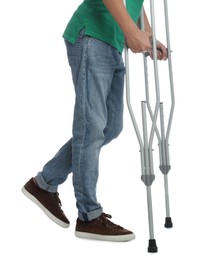 Man with injured leg using crutches on white background, closeup