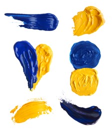 Different paint strokes drawn with brush on white background, top view