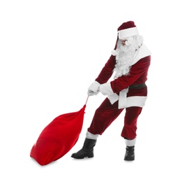 Santa Claus pulling red sack on white background