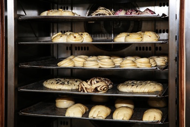 Oven with pastries in bakery workshop