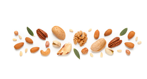 Photo of Different delicious nuts on white background, flat lay